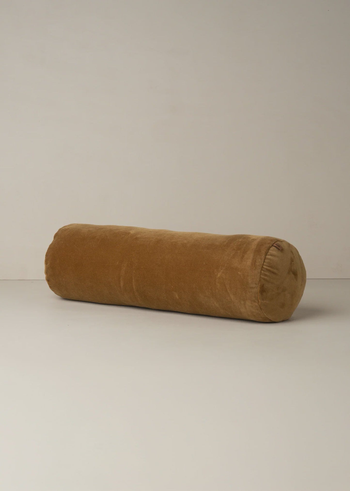 Velvet structured bolster cushion